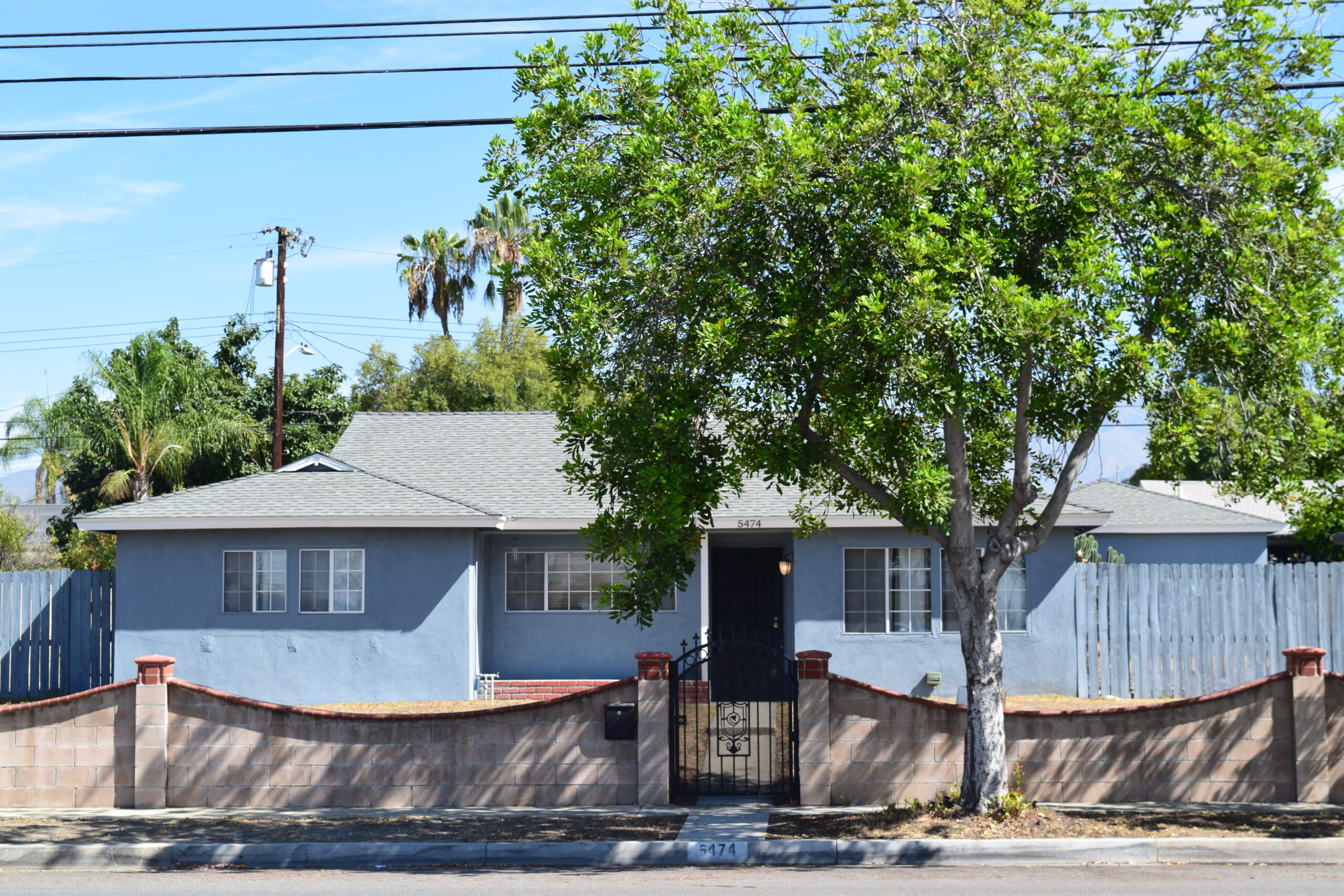 Front exterior of 5474 San Bernardino St, Montclair CA 91763 — 4 bed, 2 bath single-family home now offered at 9,900